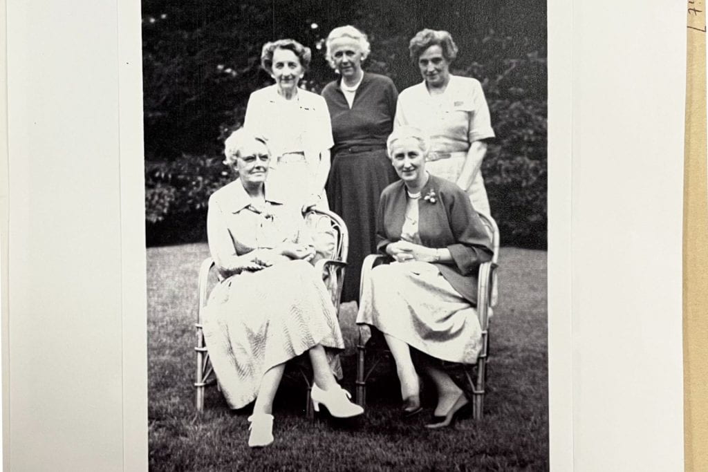 Five women gathered for photo